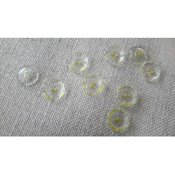 Occasione n. 7 bottoni rotondi 2 fori colore trasparente e giallo cm 1,4
