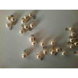 7443) N. 10 perle finte...